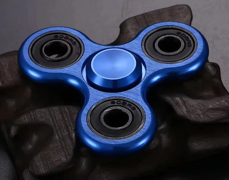 Spinner Metálico Antiestrés – Alivio Sensorial y Mejora de la Concentración