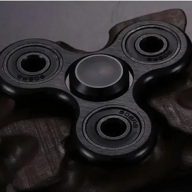 Spinner Metálico Antiestrés – Alivio Sensorial y Mejora de la Concentración